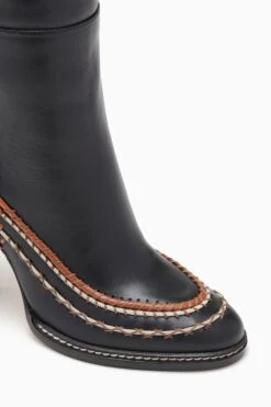 ULLA JOHNSON Arlette Knee High Boot - Noir 8 ULLA JOHNSON Arlette Knee High Boot - Noir -Chic Clothing Store FA231013 KNEEHIGHBOOTWITHSTITCHDETAIL NOIR c r web