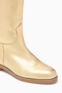 ULLA JOHNSON Ninia Riding Boot - Gold -Chic Clothing Store FA231018 NINIARIDINGBOOT GOLD c r web
