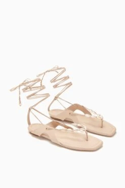 ULLA JOHNSON Romina Shell Laceup Sandal - Powder -Chic Clothing Store PF231016 ShellLace UpFlat Powder d r web 2d693607 b900 4aed b32b 9d695a05e0fc