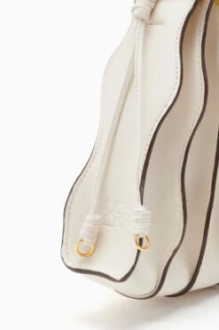 ULLA JOHNSON Adria Small Pleated Wave Bag - Alabaster 7 ULLA JOHNSON Adria Small Pleated Wave Bag - Alabaster -Chic Clothing Store PF231125 SmallPleatedBag Alabaster c r web